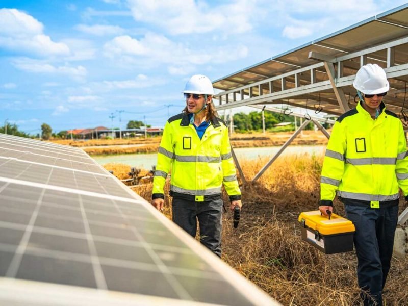 technician-in-high-visibility-safety-gear-inspects-9TQNA2H-1024×683 solar power plant solutions